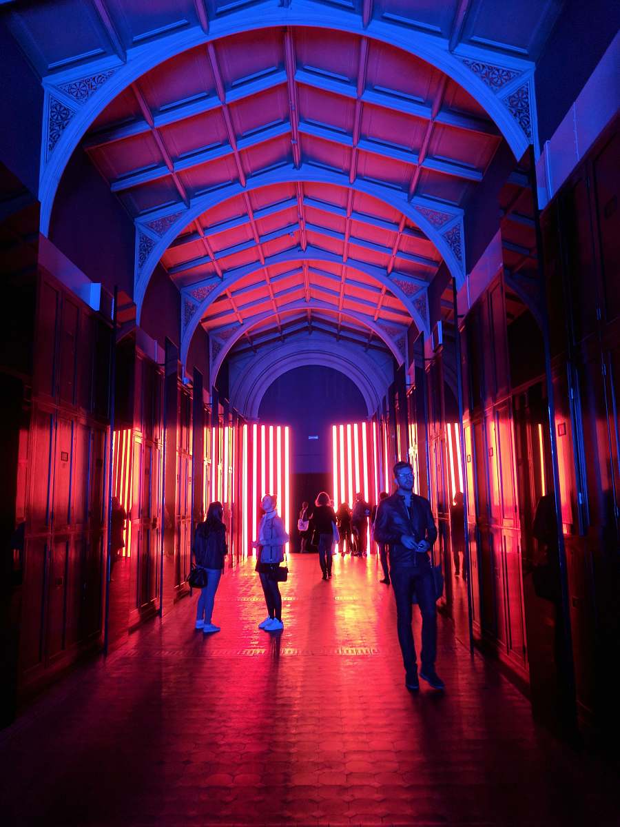 victoria and albert museum people walking on alley with white roof during nighttime london